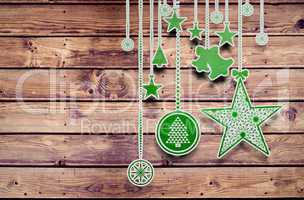 Composite image of hanging christmas decorations