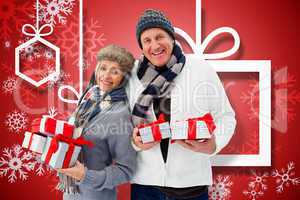 Composite image of festive mature couple holding christmas gifts