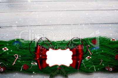 Composite image of fir branch christmas decoration garland