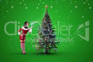 Composite image of pretty girl in santa outfit blowing