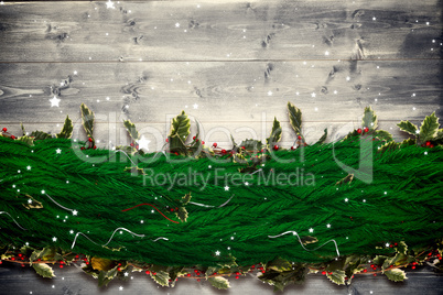 Composite image of fir branch christmas decoration garland