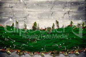 Composite image of fir branch christmas decoration garland