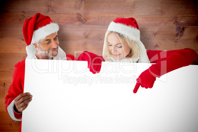 Composite image of festive couple