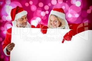 Composite image of festive couple