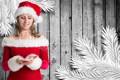 Composite image of pretty girl in santa outfit