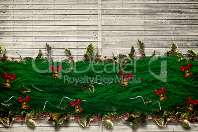 Composite image of fir branch christmas decoration garland