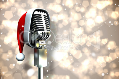 Composite image of microphone with santa hat