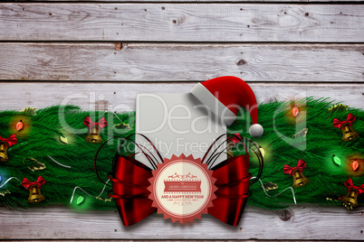 Composite image of fir branch christmas decoration garland