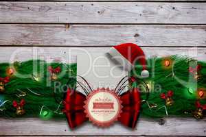 Composite image of fir branch christmas decoration garland