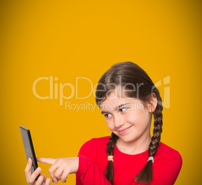 Composite image of cute little girl using smartphone