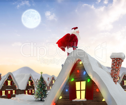 Composite image of santa claus carrying sack