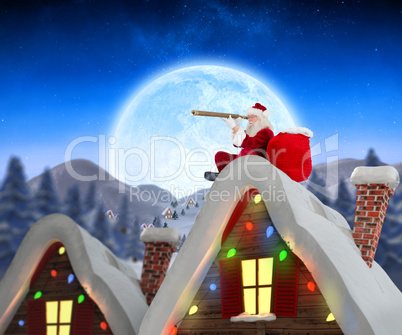 Composite image of santa sitting on roof of cottage