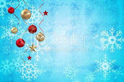 Composite image of hanging christmas decorations and streamers