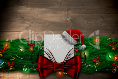 Composite image of fir branch christmas decoration garland