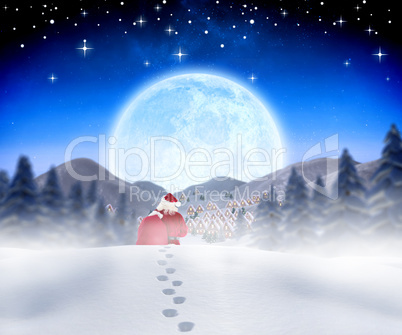 Composite image of santa walking in the snow