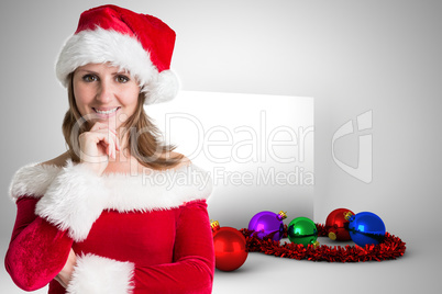 Composite image of pretty girl in santa outfit