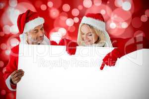 Composite image of festive couple