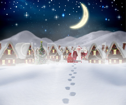 Composite image of santa walking in the snow