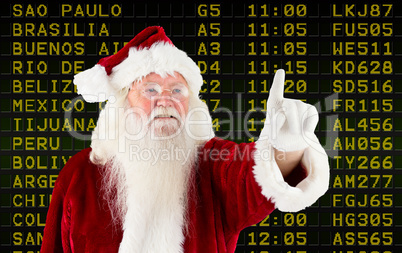 Composite image of santa claus pointing