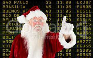 Composite image of santa claus pointing