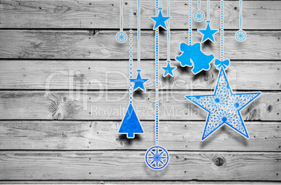 Composite image of hanging christmas decorations