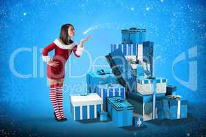 Composite image of pretty girl in santa outfit blowing