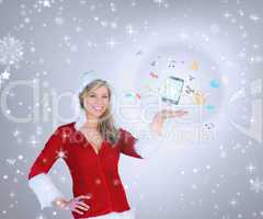 Composite image of pretty girl presenting in santa outfit