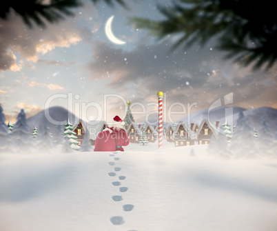 Composite image of santa walking in the snow