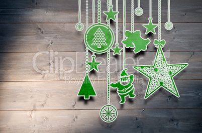 Composite image of hanging christmas decorations