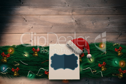 Composite image of fir branch christmas decoration garland Composite image of fir branch christmas decoration garland