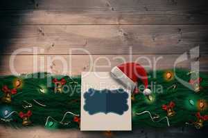 Composite image of fir branch christmas decoration garland