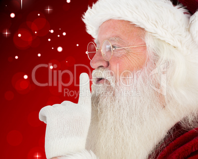 Composite image of santa claus making quiet sign