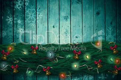 Composite image of fir branch christmas decoration garland