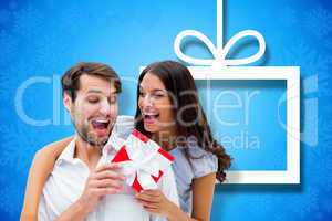 Composite image of woman surprising boyfriend with gift