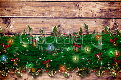 Composite image of fir branch christmas decoration garland