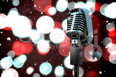 Composite image of microphone with santa hat