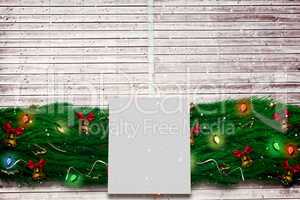 Composite image of fir branch christmas decoration garland