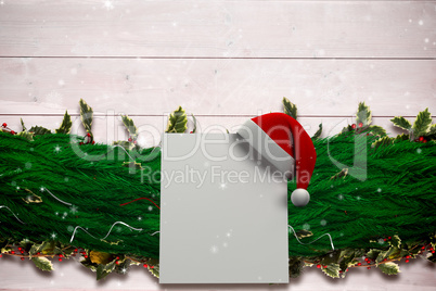 Composite image of fir branch christmas decoration garland