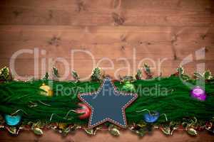 Composite image of fir branch christmas decoration garland