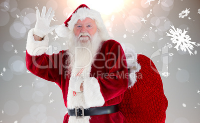 Composite image of santa claus waving