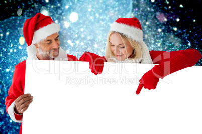 Composite image of festive couple Composite image of festive couple