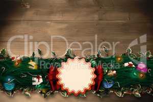 Composite image of fir branch christmas decoration garland