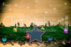 Composite image of fir branch christmas decoration garland