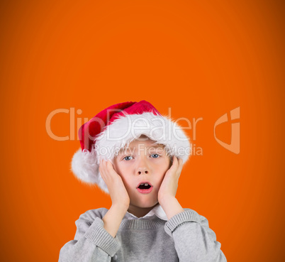 Composite image of festive surprised boy