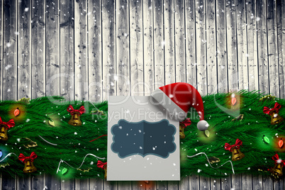 Composite image of fir branch christmas decoration garland