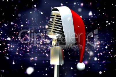 Composite image of microphone with santa hat