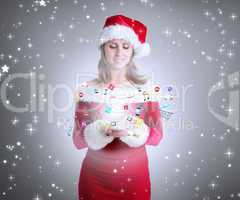 Composite image of pretty girl in santa outfit