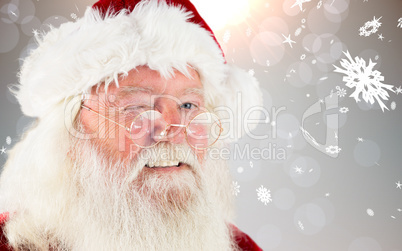 Composite image of santa claus winking