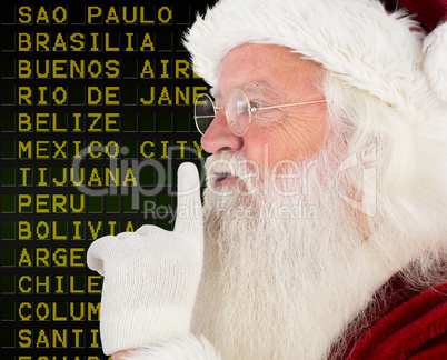 Composite image of santa claus making quiet sign