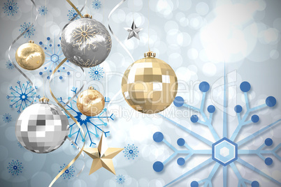 Composite image of hanging christmas bauble decorations